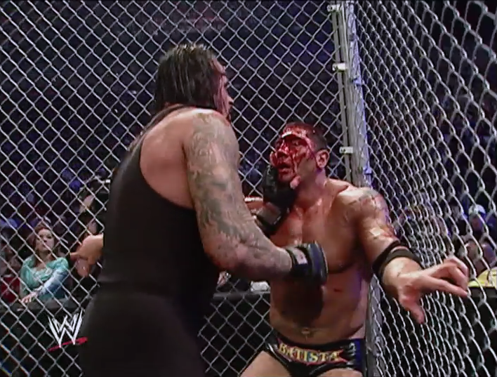 Batista vs The Undertaker (WWE, 11-18-2007) .